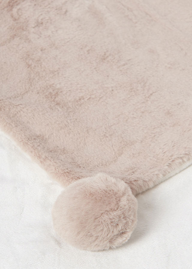 Coperta in pelliccia con pon pon
