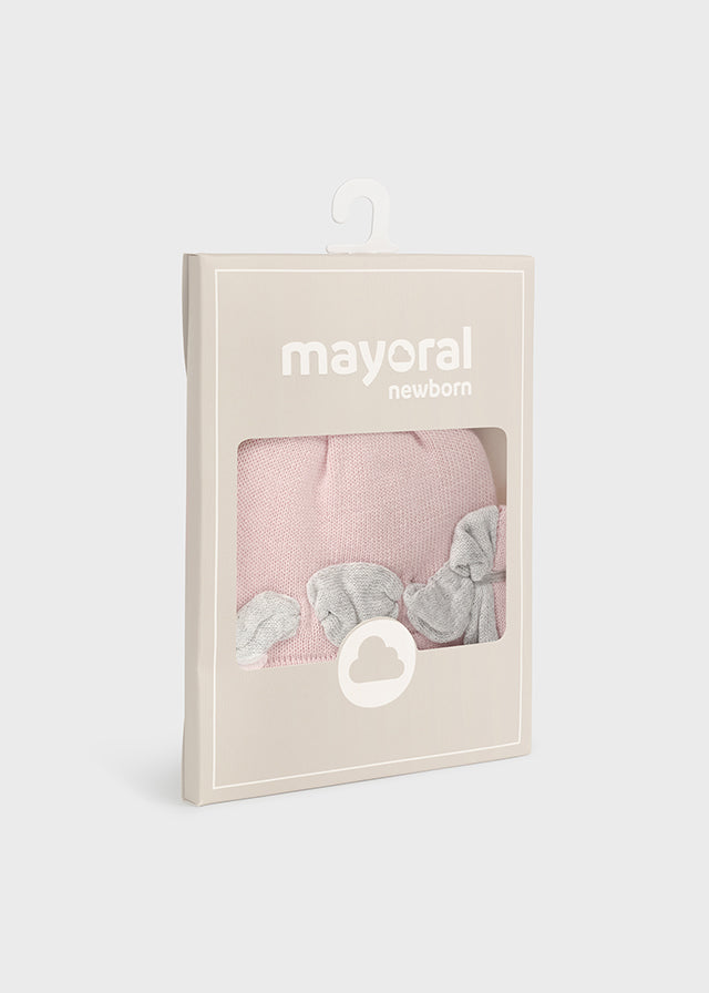 Cappello nascita in tricot con pon pon
