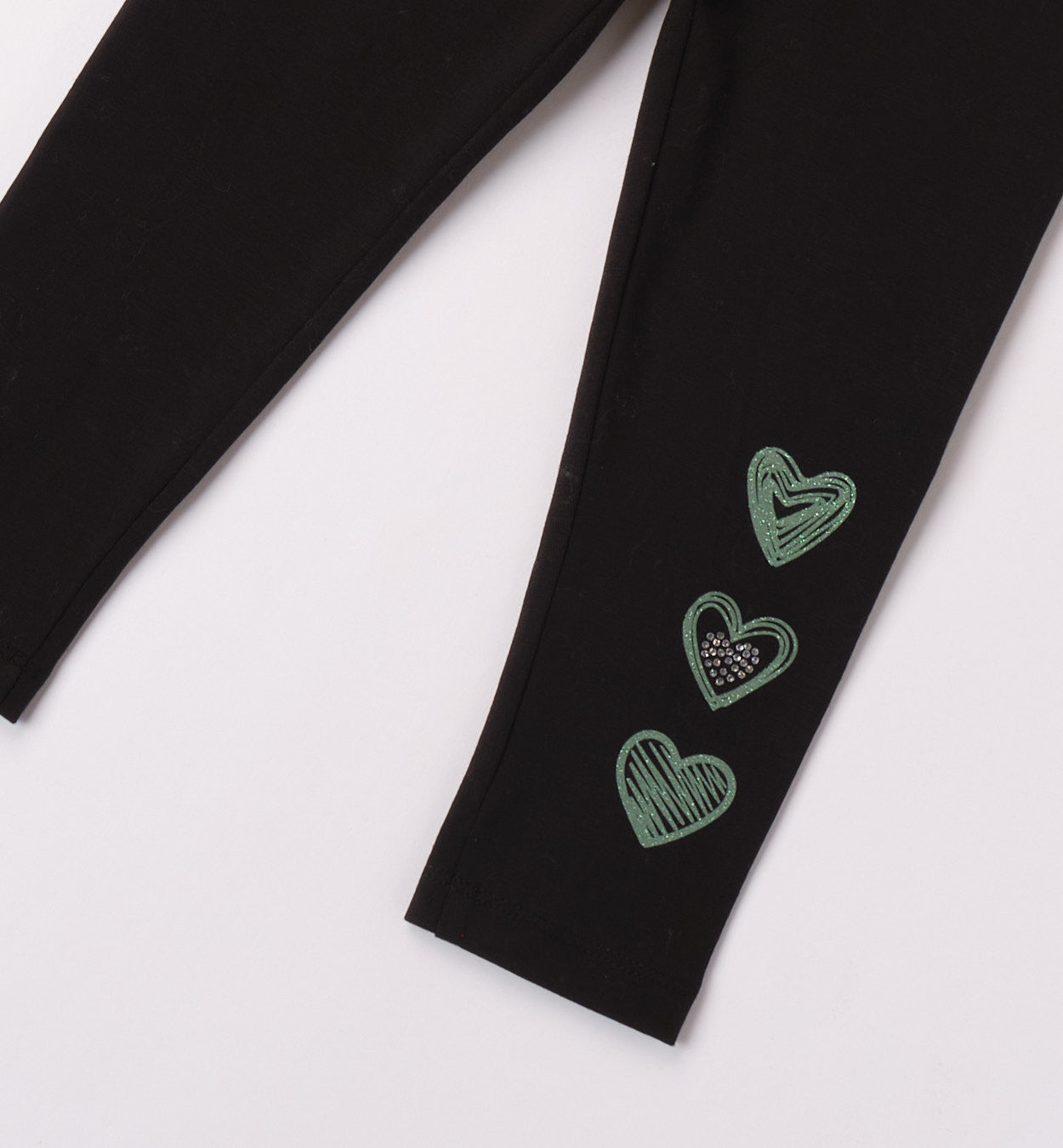 Leggins tinta unita con applicazione cuoricini