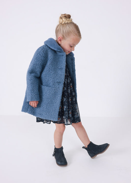 Cappotto in bouclé con collo in pelliccia