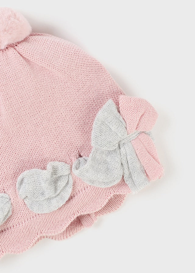 Cappello nascita in tricot con pon pon
