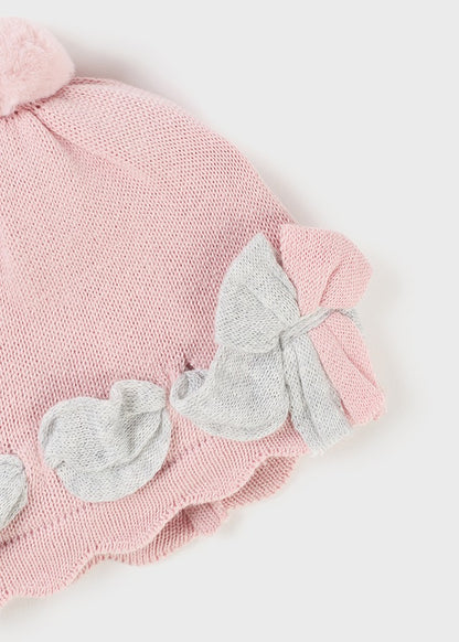 Cappello nascita in tricot con pon pon