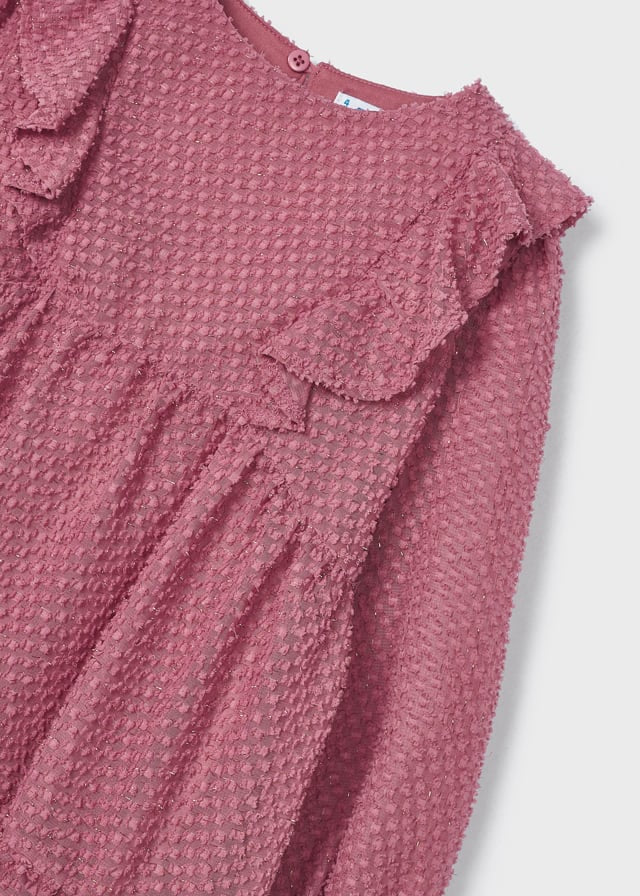 Coperta in pelliccia con pon pon