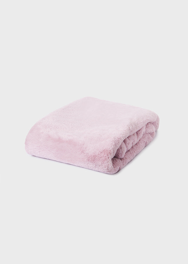 Coperta in pelliccia con pon pon